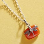 Carnelian and quartz pendant necklace, 'Courageous Flutter' - Natural Carnelian Dragonfly Pendant Necklace with Quartz Gem