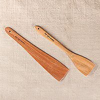 Wood spatulas, 'Serve with Joy' (set of 2) - Indian-Made Hand-Carved Set of 2 Polished Neem Wood Spatulas