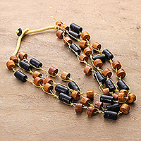 Wood beaded station necklace, 'Solar Alliance' - Brown and Black Haldu Wood Station Necklace Made in India