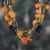 Wood beaded station necklace, 'Solar Alliance' - Brown and Black Haldu Wood Station Necklace Made in India