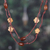 Wood long station necklace, 'Starry Forest' - Star-Themed Bohemian Brown Haldu Wood Long Station Necklace