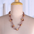 Wood long station necklace, 'Starry Forest' - Star-Themed Bohemian Brown Haldu Wood Long Station Necklace