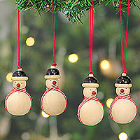 Wood ornaments, 'Joyful Snowmen' (set of 4) - Christmas-Themed Wooden 4-Piece Set of Snowman Ornaments