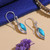 Calcite dangle earrings, 'Heavenly Flare' - Sterling Silver Dangle Earrings with Calcite Stone Cabochons