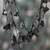 Hand-carved beaded statement necklace, 'Bohemian Night' - Hand-Carved and Painted Black Beaded Statement Necklace