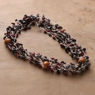 Wood beaded strand necklace, 'Beats of Puissance' - Fair Trade Dark and Red-Toned Wood Beaded Strand Necklace