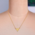 Brass pendant necklace, 'Prestige Pyramid' - Minimalist High-Polished Brass Pyramid Pendant Necklace