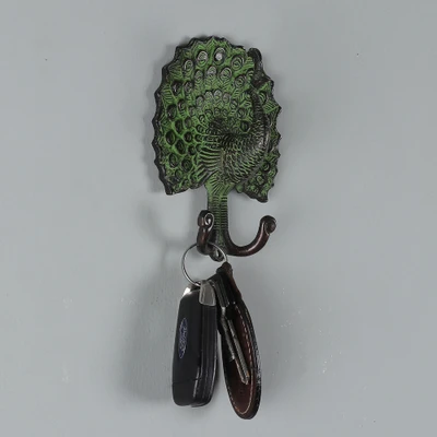 Brass wall hook, 'Peacock Ancestry' - Peacock-Themed Antiqued Brass Wall Hook Crafted in India