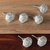 Ceramic knobs, 'Modern Sylvan' (set of 6) - Minimalist Leafy 6-Piece Green and Ivory Ceramic Knob Set