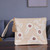 Embroidered cotton cosmetic bag, 'Tranquil Spring' - Floral Beige and Ivory Embroidered 100% Cotton Cosmetic Bag