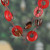 Wood beaded station necklace, 'Red Eternity' - Bohemian-Inspired Red and Brown Wood Beaded Station Necklace