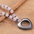 Rose quartz and hematite beaded pendant necklace, 'Heart for Love' - Handmade Rose Quartz and Hematite Heart Pendant Necklace