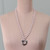 Rose quartz and hematite beaded pendant necklace, 'Heart for Love' - Handmade Rose Quartz and Hematite Heart Pendant Necklace