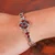 Garnet pendant bracelet, 'Essence of Passion' - Polished and Oxidized Seven-Carat Garnet Pendant Bracelet