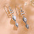 Cultured pearl dangle earrings, 'Pearly Romance' - Natural Cream and Grey Cultured Pearl Heart Dangle Earrings