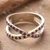 Ruby multi-stone band ring, 'Faithful Constellations' - Crisscross Silver Band Ring with Pavé-Set Ruby Gemstones