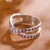 Ruby multi-stone band ring, 'Faithful Constellations' - Crisscross Silver Band Ring with Pavé-Set Ruby Gemstones