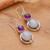 Rainbow moonstone and amethyst dangle earrings, 'Glowing Harmony' - 16-Carat Rainbow Moonstone Amethyst Silver Dangle Earrings