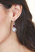 Rainbow moonstone and amethyst dangle earrings, 'Glowing Harmony' - 16-Carat Rainbow Moonstone Amethyst Silver Dangle Earrings