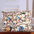Embroidered cotton cushion covers, 'Sinuous Flora' (pair) - Spring-Themed Acrylic Embroidered Cotton Cushion Cover Pair