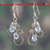 Blue topaz dangle earrings, 'Soothing Leaves' - Leaf Tendril-Themed Silver Earrings with Blue Topaz Stones