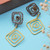 Brass drop earrings, 'Modern Spirals' - Spiral-Themed Modern Darkened Polished Brass Drop Earrings