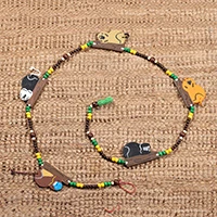 Ceramic and wood beaded wall accent, 'Monkey Charm' - Ceramic and Wood Beaded Wall Accent with Monkey Motifs