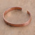 Copper cuff bracelet, 'Sunset Flight' - Sunset-Themed Bohemian Engraved Copper Cuff Bracelet