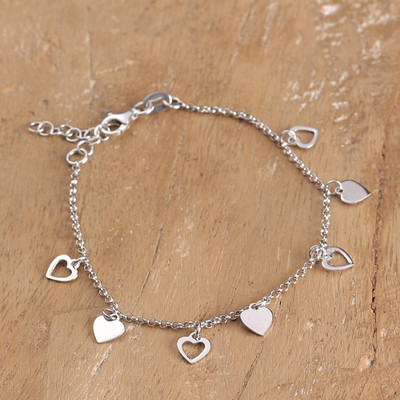 Sterling silver charm bracelet, 'Love Facets' - Romantic High-Polished Sterling Silver Heart Charm Bracelet