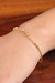 Gold-polished charm bracelet, 'Days of Glory' - Gold-Polished Sterling Silver and Cubic Zirconia Bracelet