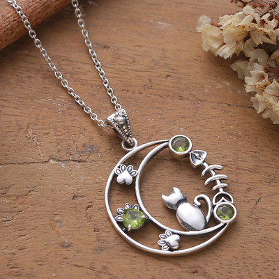 Peridot pendant necklace, 'Feline Crescent Dreams' - Cat and Crescent Moon-Themed Peridot Silver Pendant Necklace