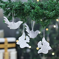 Embossed ornaments, 'Air and Sea' (set of 4) - 4 Bird Fish-Themed Embossed Faux Leather Christmas Ornaments