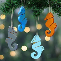 Wood ornaments, 'Seahorse Splendor' (set of 4) - 4 Seahorse-Themed Hand-Painted Wood Christmas Ornaments
