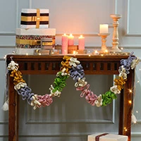 Wool felt garland, 'Cheers in Color' - Multicolor Palette 100% Wool Felt Garland Crafted in India