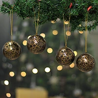 Papier mache ornaments, 'Midnight Cheers' (set of 4) - Artisan-Made 4-Piece Floral Black and Golden Ornament Set