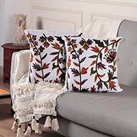 Chain-stitched cotton cushion covers, 'Floral Majesty' (pair) - Pair of Nature-Themed Embroidered Cotton Cushion Covers