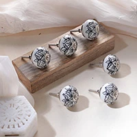 Hand-painted ceramic knobs, 'White Blooms' (set of 6) - Black and White Floral 6-Piece Ceramic Knob Set from India