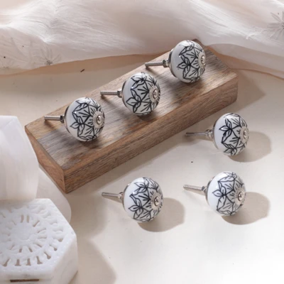 Hand-painted ceramic knobs, 'White Blooms' (set of 6) - Black and White Floral 6-Piece Ceramic Knob Set from India