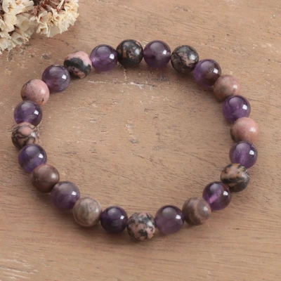 Rhodonite and amethyst beaded bracelet, 'Enchanted Feel' - Artisan-Made Rhodonite and Amethyst Beaded Stretch Bracelet
