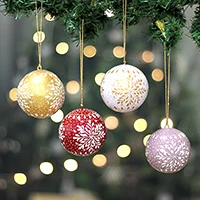 Papier mache ornaments, 'Festive Snow' (set of 4) - Christmas Snowflake-Themed 4-Piece Papier Mache Ornament Set