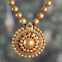 Ceramic pendant necklace, 'Victorious Gold' - Hand-Painted Golden Ceramic Pendant Necklace from India