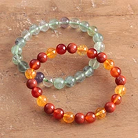 Multi-gemstone beaded stretch bracelets, 'Flames & Waves' (set of 2) - Nature-Inspired 2-Piece Multi-Gemstone Beaded Bracelet Set