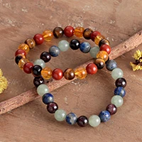 Multi-gemstone beaded stretch bracelets, 'Elemental Energies' (set of 2) - Set of 2 Blue and Red Multi-Gemstone Stretch Bead Bracelets