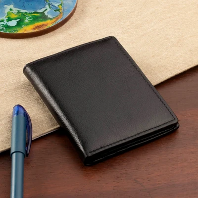 Leather card holder, 'Urban Onyx' - Solid-Hue Unisex Onyx Black 100% Leather Bi-Fold Card Holder