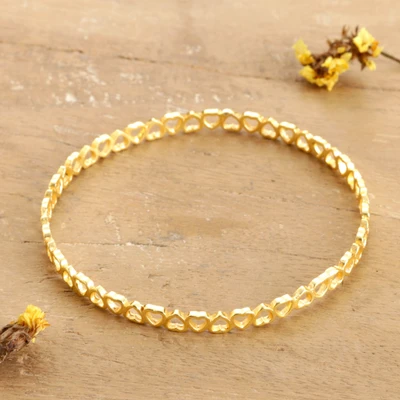 Brass bangle bracelet, 'Hearts as One' - Polished Brass Bangle Bracelet with Openwork Heart Accents