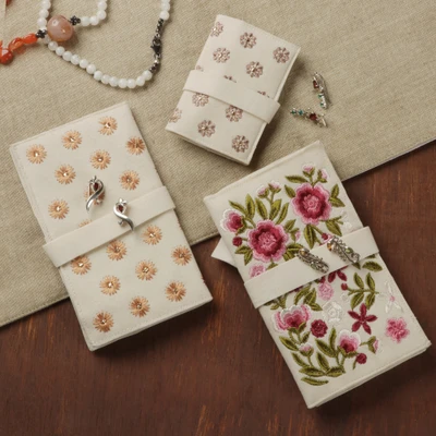 Embroidered jewelry rolls, 'Floral Saga at Dawn' (set of 3) - Set of 3 Floral Rayon Embroidered Jewelry Rolls in Ecru Hues