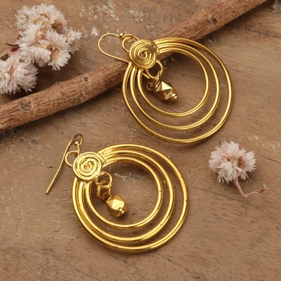 Brass dangle earrings, 'Orbiting Glow' - Boho Glamour Dangle Earrings with Gold-Toned Brass Pendants