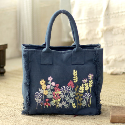 Embroidered cotton handle handbag, 'Blooming Denim' - Fringed Floral Handle Handbag Handcrafted from 100% Cotton