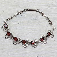 Garnet link bracelet, 'Nature's Delight' - Floral Garnet Bracelet Handcrafted in Sterling Silver