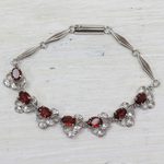 Garnet link bracelet, 'Nature's Delight' - Floral Garnet Bracelet Handcrafted in Sterling Silver